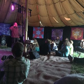 Storytellers at Unearthed in a Field