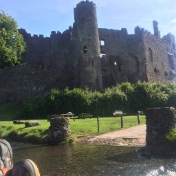 Chillin in front of Laugharne Castle.JPG.jpg