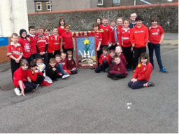 Ysgol Cwmgors (Cwmgors School) students with their 2014 Saint David's Day banner