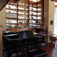 Living room, piano and fretwork detail