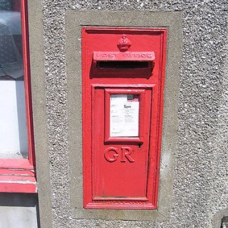 Pre 1936 Postbox bearing the royal insignia of King George V