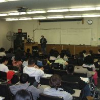 Peter reading to students in Baruch College, New York: April, 2010