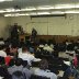 Peter reading to students in Baruch College, New York: April, 2010