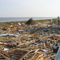 KATRINA DEBRIS BETWEEN CAMP & LEVEE