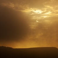 Sun Through Heavy Fog on a Clifftop