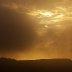 Sun Through Heavy Fog on a Clifftop