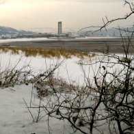 View of Meridian Tower, Swansea from beach in front of Hospital