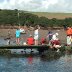 Families fishing for crabs Sandy Bay Pembrokeshire