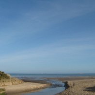 Lligwy beach river headed out to sea