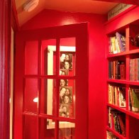 Landing at the top of a stair case converted into Call Box-Book shelf