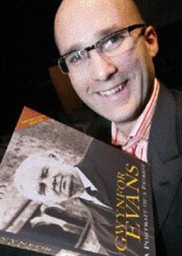 Rhys with a copy of Gwynfor Evans: A Portrait of a Patriot