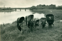 Welsh fishermen with coracles on the river