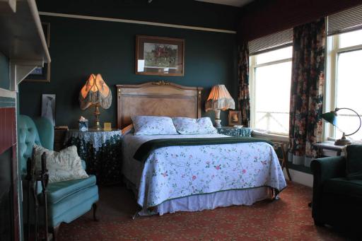 Bed and window in Agatha Christie room