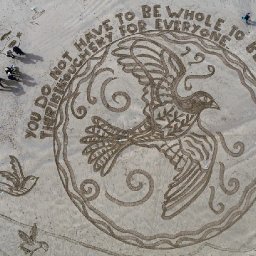 people-flock-to-beautiful-welsh-beach-to-see-giant-sand-art-created-by-charity